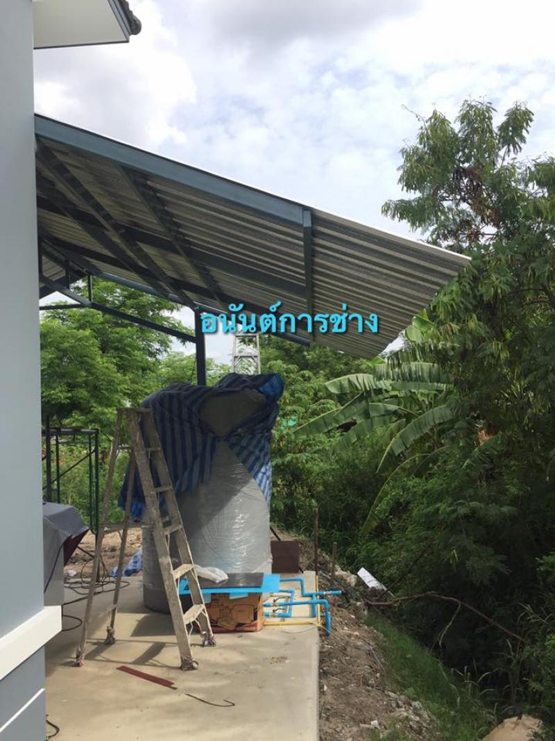 ประตูสแตนเลสผสมไม้สักเทียม - อนันต์การช่าง